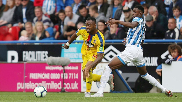 Jordan Ayew [L] in action