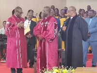 Rev. Enoch Nii Narh Thompson, incoming President being decorated with the Presidency Gon