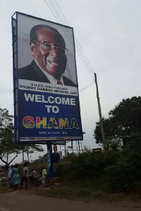 One of the billboards mounted in Accra to announce Mugabe