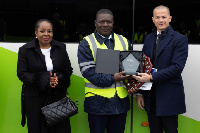 Godfried Narh Okunor receiving his award