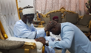 NPP Parliamentary Candidate, Farouk Aliu Mahama receiving blessings form the Chief Imam