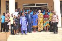 Erik Van Waveren, Global Coordinator for SNV  in a group photograph with members of the NGO