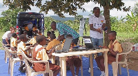 Some school children learning at the  E-Library