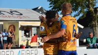 Ghanaian midfielder, Michael Baidoo with a teammate