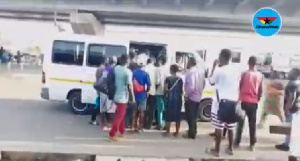 The passengers rushed to board the trotro