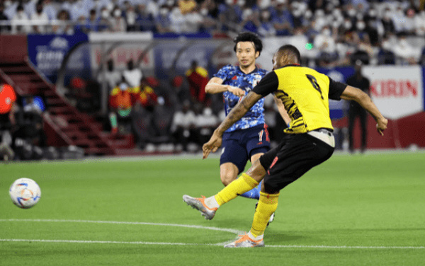 Black Stars striker, Jordan Ayew in action against Japan