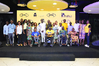 A group picture of Adwoa Wiafe, some differently abled beneficiaries, staff of MTN Ghana and Innohub