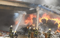 A photo of firefighters at the Makola Market during one of their fires