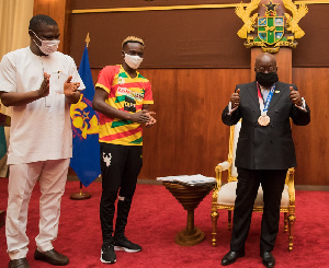 President Nana Akufo-Addo wearing the medal