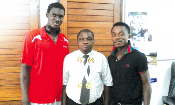 Players of Golden Rackets in a pose of an official