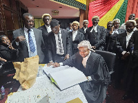 Wonder Kutor signing the Book of Roll of Lawyers after the ceremony