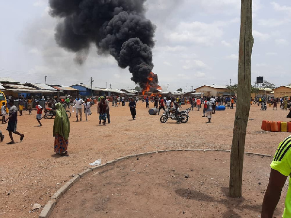 A cloud of smoke emanating from the fuel station