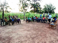 Lawra Municipal Chief Executive, Mr. Bomba-ire Martin addressing one of the communities