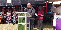 John Mahama reading the tribute at the funeral