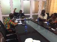 Minister-designate for Planning Prof. George Gyan-Baffour speaking with NDPC staff