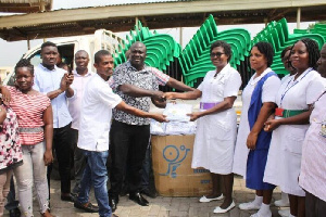 Dr.Mark Assibey Yeboah doing a presentation to a group of nurses