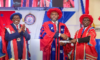 Dr. Mathew Opoku Prempeh (middle)