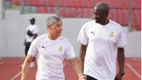 Coach Chris Hughton and Otto Addo