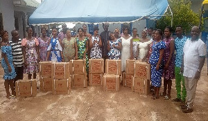 The MP and recipients of the donation