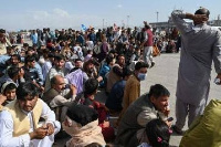 Hundreds of Afghans are scrambling to leave the country after Taliban seized power