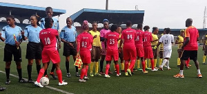 A cross-section of players and officials during a match between Royal Queens and Osun Babes