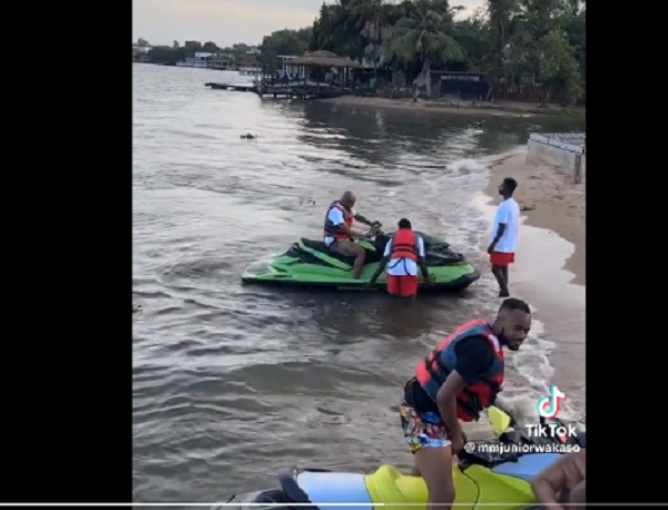 Andre on the jet ski and Jordan about to get on