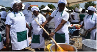 School feeding caterers in the process of cooking