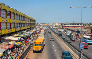 People walking in the big market in Accra