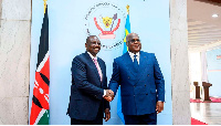 Kenyan President William Ruto (L) greets the President of DR  Congo Felix Tshisekedi (R)