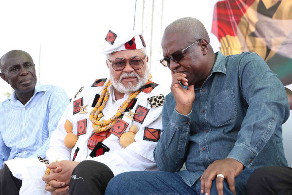 File Photo: John Dramani Mahama, flagbearer of NDC confers with Jerry John Rawlings at an event