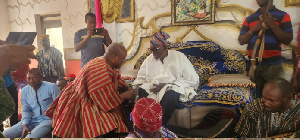 Former President John Dramani Mahama greeting Bolewura Sarfo Kutuge Feso (I)