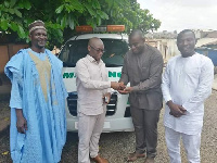 Gibrine donating to the Asamankese Zongo Community in the Eastern region