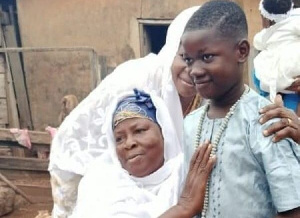 The 11-year-old deceased in a pose with his mother