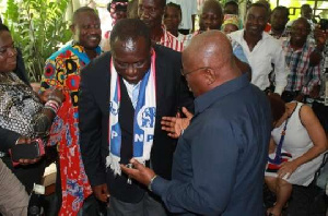 Vincent Sowah Odotei (left) interacts with opposition leader Akufo-Addo