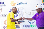 Sports Minister Mustapha Ussif presenting the trophy to Dabrah