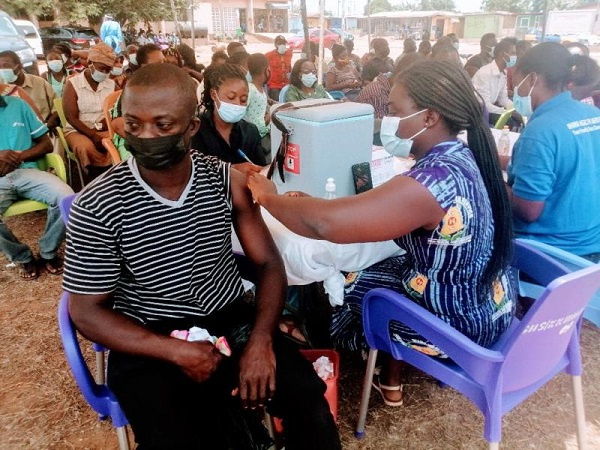 A participant receiving his jab of the vaccine