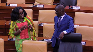 Attorney General Gloria Akuffo chats with Minority Leader Haruna Iddrisu ahead of the presentation