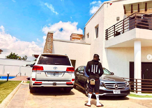 Dancehall artist Shatta Wale with new Benz