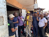 Mr Kofi-Nti interacting with some Spare Parts Dealers at Abossey Okai