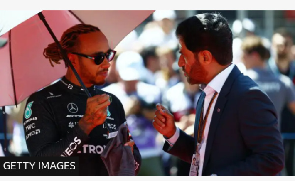 FIA  president Mohammed Ben Sulayem (right, with Lewis Hamilton) pictured at the 2022 Azerbaijan