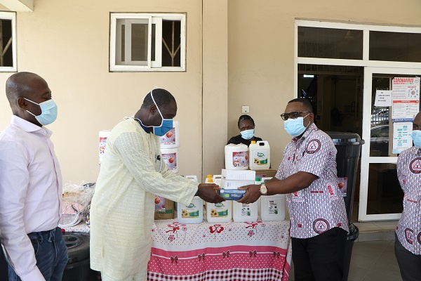 Officials taking receipt of the items