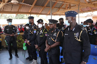 Dampare (middle) with members of the police top hierarchy