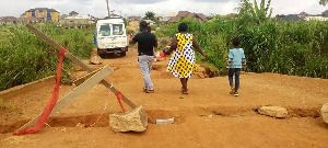 The state of the abandoned bridge project at Abuakwa-Apemhaase