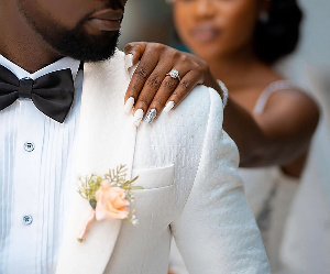 File photo of a couple flaunting their wedding rings