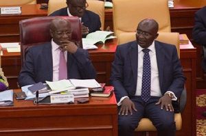 Osei Kyei-Mensah-Bonsu (left) with Dr Mahamudu Bawumia on the floor of parliament