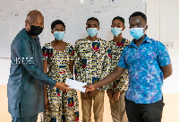 Samuel Okudzeto Ablakwa presenting the cash on behalf of Prof. Jane Opoku-Agyemang(Kobby Blay photo)