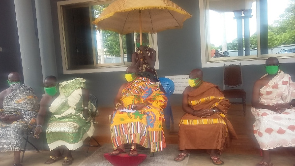 Daasebre Dr. Diawuo II seated in the middle with the Berekum Traditional Council