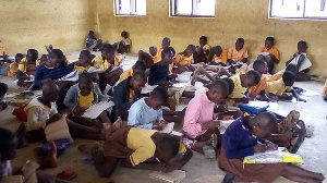 Pupils in Guo D/A primary school don't have furniture to sit on during class hours