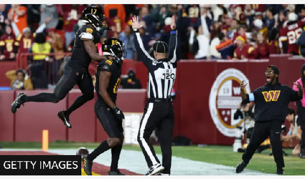 Noah Brown celebrates catching Jayden Daniels' last-gasp Hail Mary