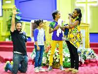 Majid Michel with his family